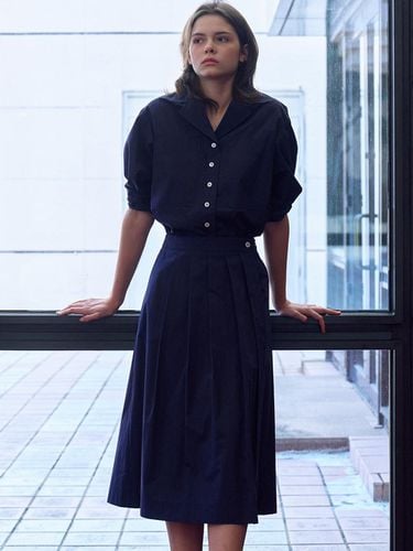 Button Tuck Flared Skirt_Navy - a.t.corner - Modalova