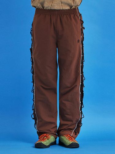 String Nylon Pants_Brown - UNALLOYED - Modalova