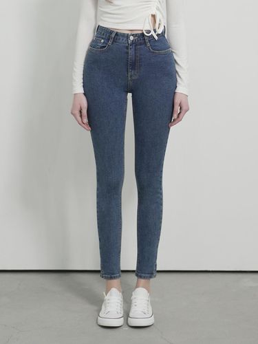 Side Slit Skinny Denim Pants - WAAR - Modalova