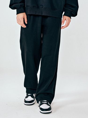 Solid Wide Sweatpants_Black - MOMENTISM - Modalova