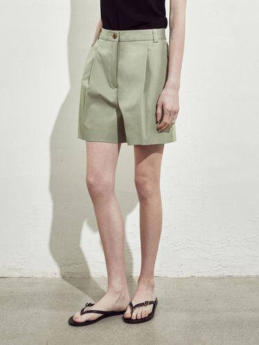 TAILORED BUTTON HALF PANTS_KHAKI - RIDIFI - Modalova