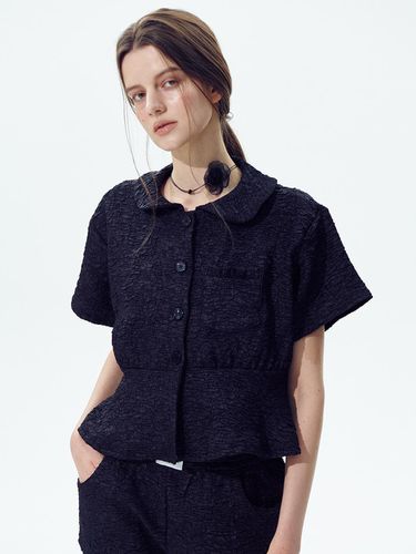 Ruffle resort blouse jacket, black - Foli - Modalova