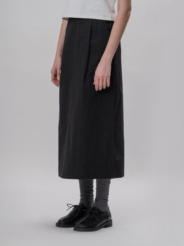 Neatly button skirt (black) - THE MITTEN - Modalova