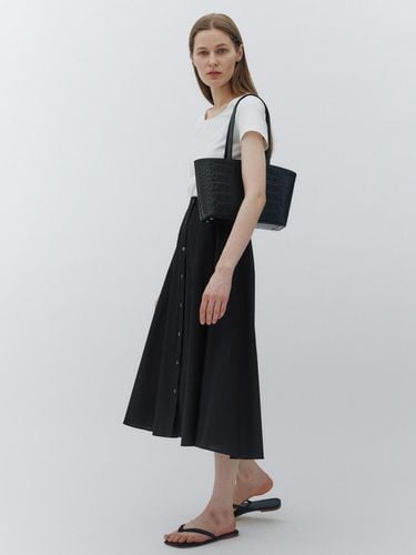 Button flare skirt (Black) - KLEAN - Modalova