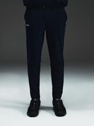 Unisex regular fit SPEED stretch track pants navy_ - Head - Modalova