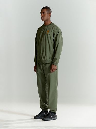 EDELWEISS] Semi-overfit nylon jogger pants - Head - Modalova