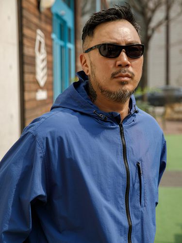 Authentic Hooded Windbreaker_Blue - RUGGED HOUSE - Modalova