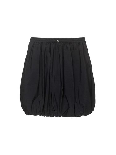 String Mini Skirt (Black) - RAIVE - Modalova