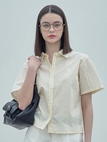 Classy Emblem Half Shirts_Beige - ELLIOTI - Modalova