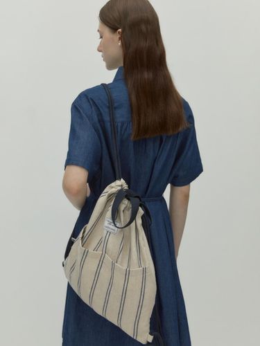 Mignon Drawstring Backpack_Navy Stripe - DEPOUND - Modalova