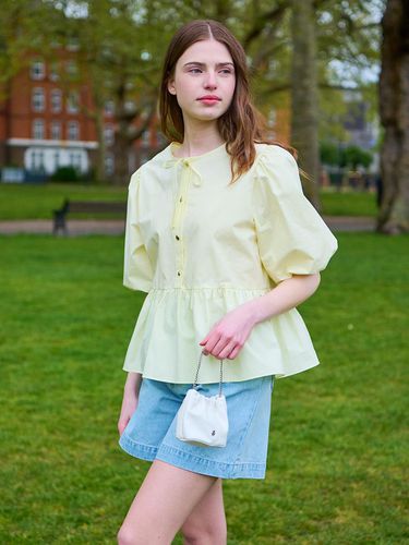 Two-Way Puff Peplum Blouse_Yellow - OSTKAKA - Modalova