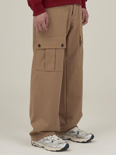 Button Cargo Pants Beige - FAMILLE - Modalova