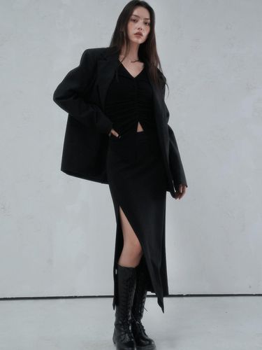 La Oblique Slit Long Skirt BLACK - vivacious - Modalova