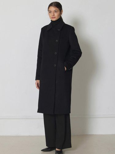 Balanced black wool coat - manuelle et guillaume - Modalova