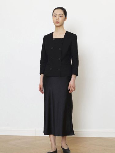 Signature black satin skirt - manuelle et guillaume - Modalova