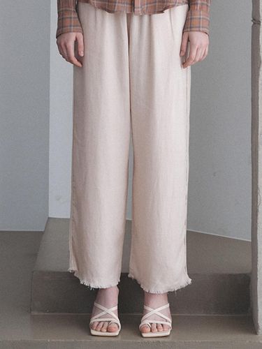 Wide cutting pants (beige) - LEI AVERY - Modalova