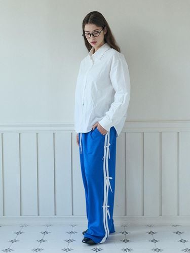 RIBBON TRACK PANTS_BLUE - PINK PINEAPPLE - Modalova