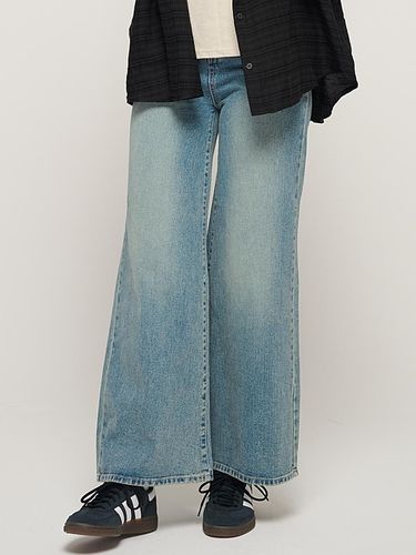 Wide bootcut denim pants () - CARGOBROS - Modalova