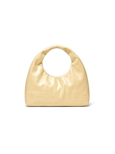 EMBOSSED LOGO LEATHER MINI TOTE BAG - Matin Kim - Modalova