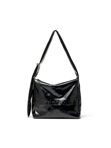 EMBOSSED LOGO LEATHER SHOULDER BAG IN - Matin Kim - Modalova