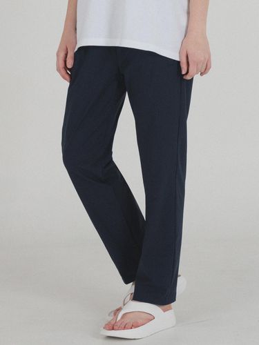 Cool spandex zipper pocket sweat pants (Navy) - PIANER - Modalova