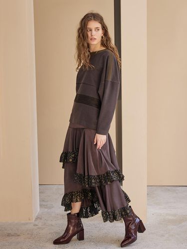 Ruffle Trimmed Asymmetric Long Skirt_Dark Brown - CAHIERS - Modalova