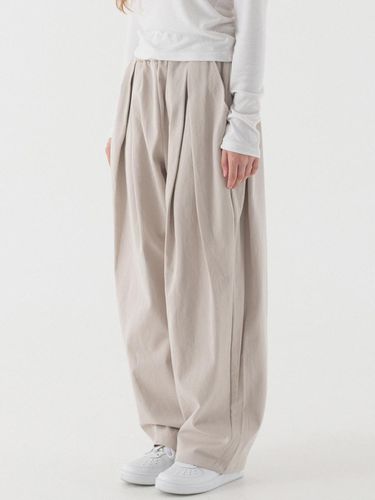 Double pleated wide BANDING cotton pants (light be - PIANER - Modalova