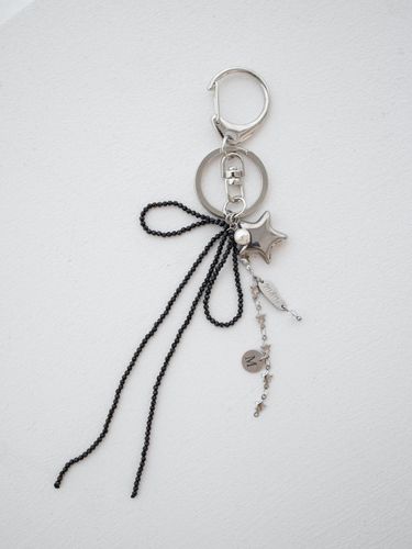 Black ribbon and star keyring - MERRYMOTIVE - Modalova