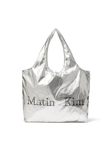 MATIN CRACKED LOGO GLOSSY ECOBAG IN - Matin Kim - Modalova