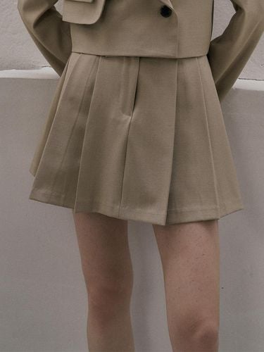 Pleated mini skirt_BEIGE - Fine O’ Kind - Modalova