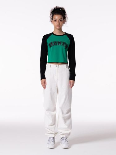 FRONT LOGO EMBROIDERY TUCK PANTS - WHITE - MAKE A TOAST - Modalova