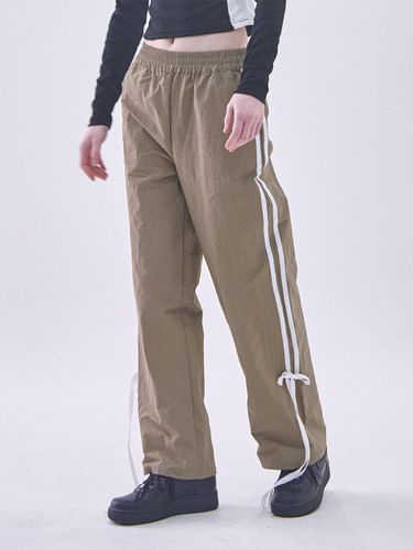 Tape Line Banding Track Pants [Brown] - SOMEPLACE - Modalova