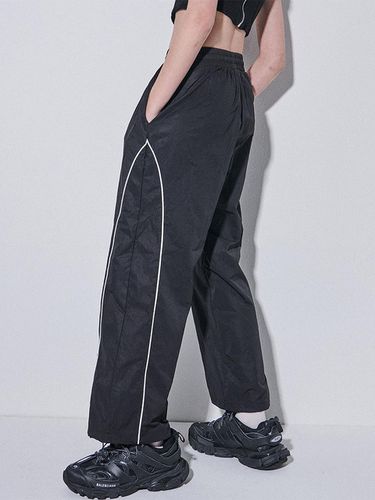 Piping Line Wide Jogger Pants_Black - SOMEPLACE - Modalova