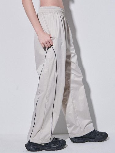 Piping Line Wide Jogger Pants_Beige - SOMEPLACE - Modalova