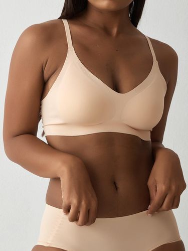 Seamless laser cut bra top - HUGDAY - Modalova