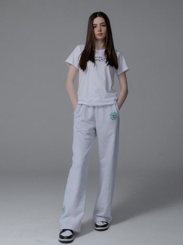 CLOVER SWEAT PANTS_WHITE MELANGE GREEN/IVORY GREEN - mars en avril - Modalova