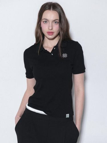 CLOVER KARA BUTTON TSHIRT_BLACK - mars en avril - Modalova