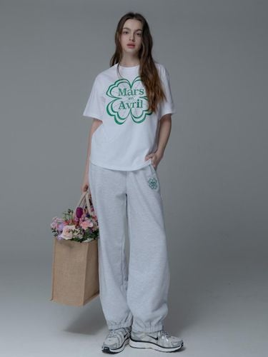 CLOVER NEEDLEWORK ZIPPOCKET SWEAT PANTS_WHITE - mars en avril - Modalova