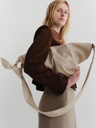 Vegan leather sling bag_beige - ARCHAIC - Modalova