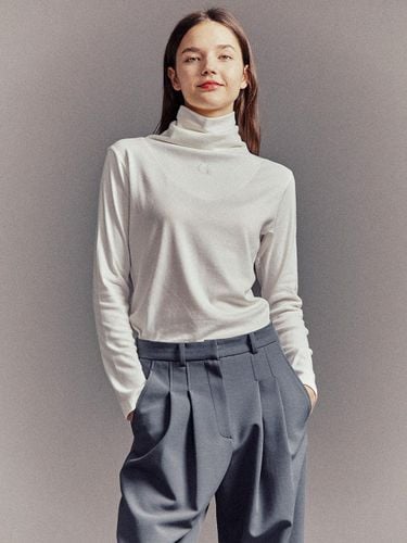 Loose Turtle Neck Cotton Modal Top [White] - Cocancl - Modalova