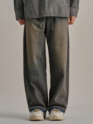 Hem Contrast Washed Diagonal Denim Pants [Indigo] - NONTYPE - Modalova