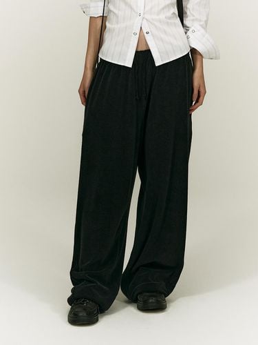 Terry Cotton-Blend Wide-Fit Jogger Pants [BLACK] - SALTY PEBBLE - Modalova