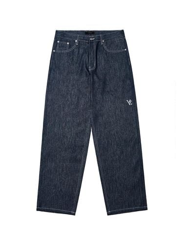 D Monogram Rain-Coated Tapered Denim Pants [Blue] - VARZAR - Modalova