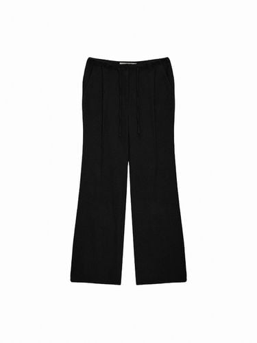 Waist Button String Slim Pants [Black] - Matin Kim - Modalova