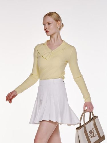 Point Snap Pleated A-line Skirt [Beige] - FAIRLIAR GOLF - Modalova