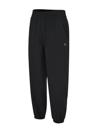 Groove Slim Jogger Fit Polyester Pants [Black] (U4TPV3205BK) - UFCSPORT - Modalova