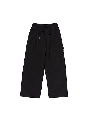 Side strap nylon wide pants (black) - OTHERFITS - Modalova