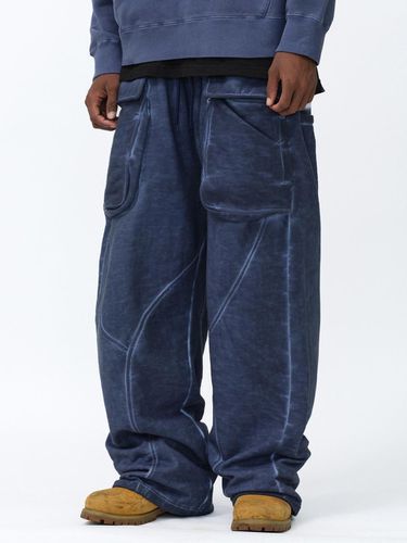 CUT OUT SWEAT PANTS [NAVY] - SUADE - Modalova