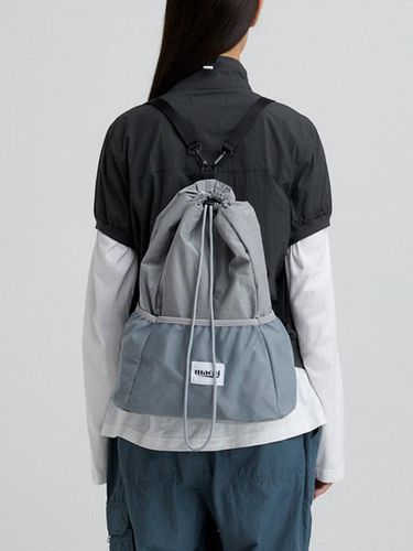 DRAWSTRING MESH BACKPACK_GREY - macni - Modalova