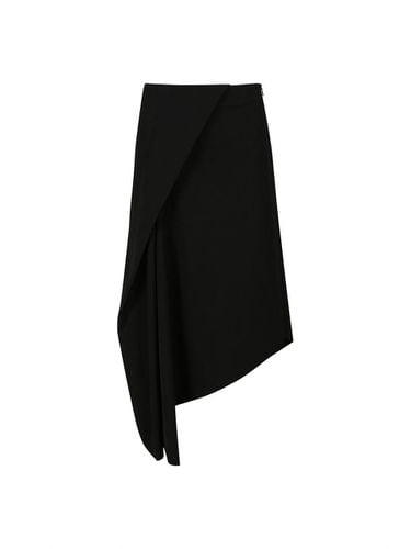 ASYMMETRIC WRAP MIDI SKIRT (BLACK) - YCH - Modalova